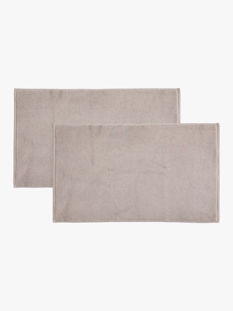 Legjobb fürdőszőnyegek 2025-re: Emeld meg a tér hangulatát!